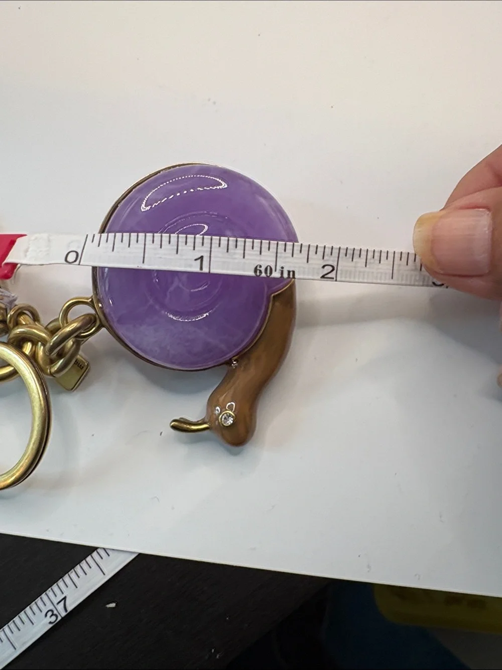Coach key charm